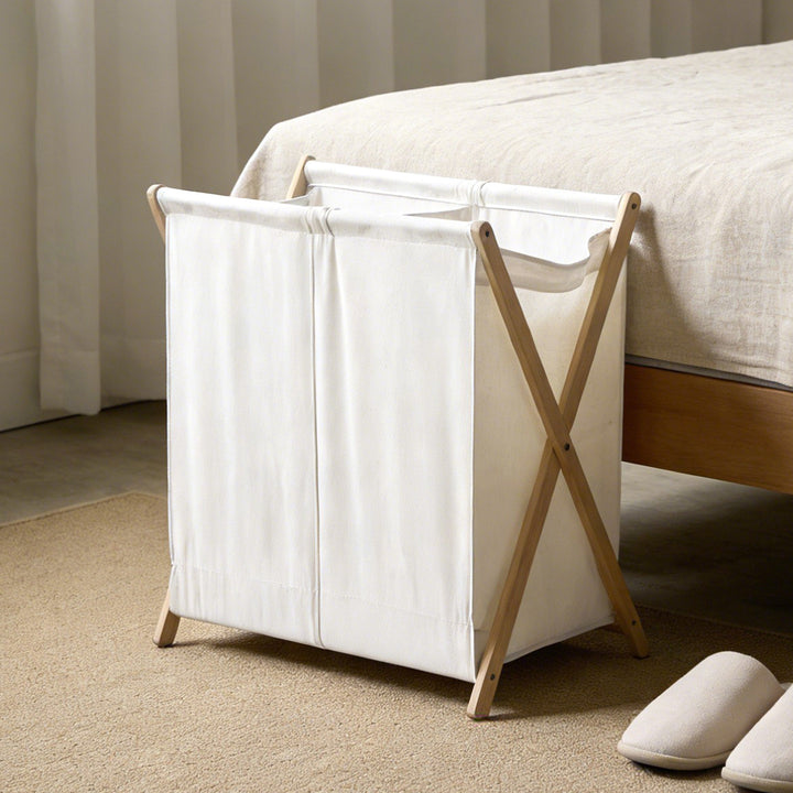 Modern laundry basket with folding frame
