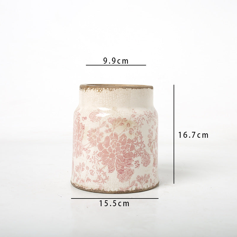 Decorative flower pot with floral decoration