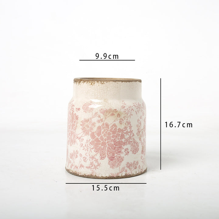 Decorative flower pot with floral decoration