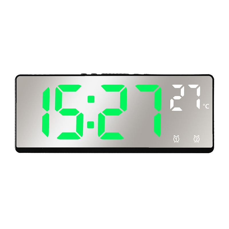 Digital alarm clock with temperature sensor and mirror function