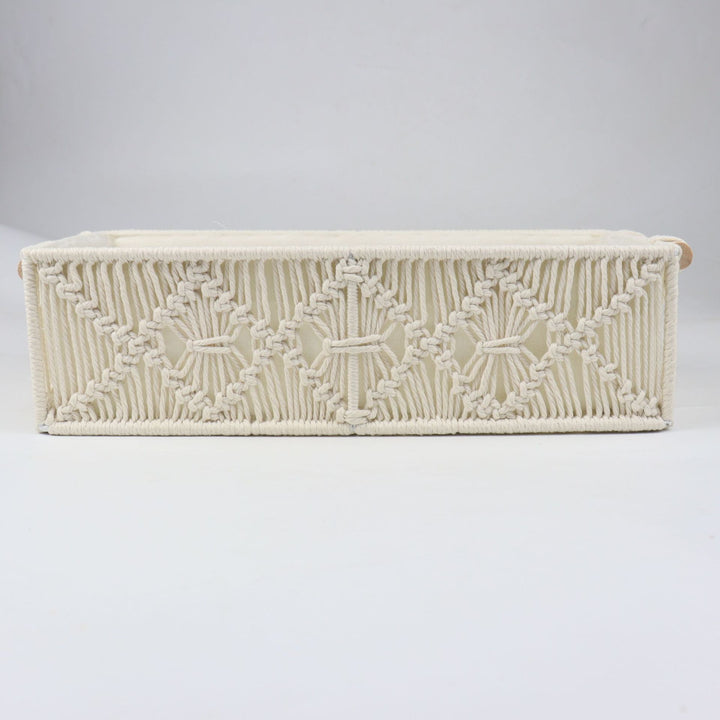 Storage basket with macrame pattern