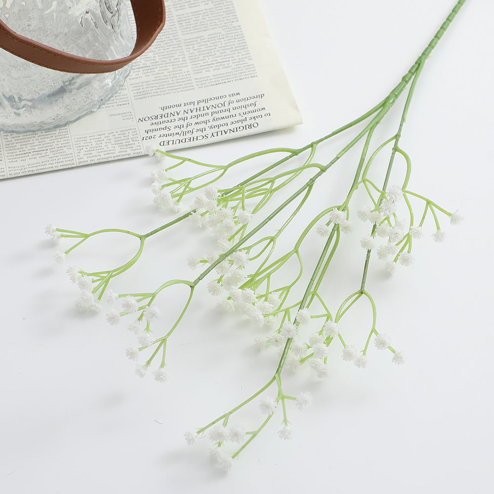 Decorative artificial flower branch with fine purple flowers