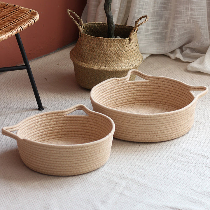 Decorated basket with practical handles
