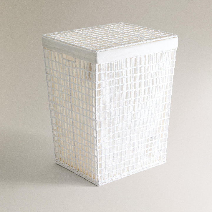 Modern laundry basket with embroidered pattern