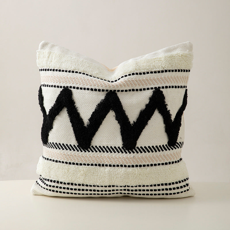 Handwoven decorative cushion cover made of cotton blend with tassels and structured stripe look