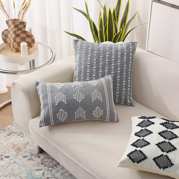 Woven decorative cushion cover with hand-tufted geometric pattern
