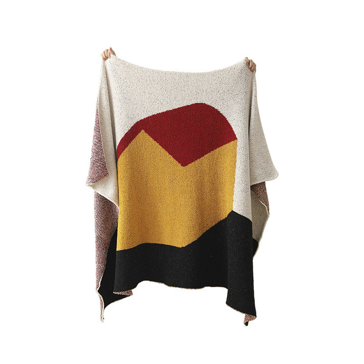 Coarsely woven decorative blanket with geometric jacquard pattern and soft bouclé