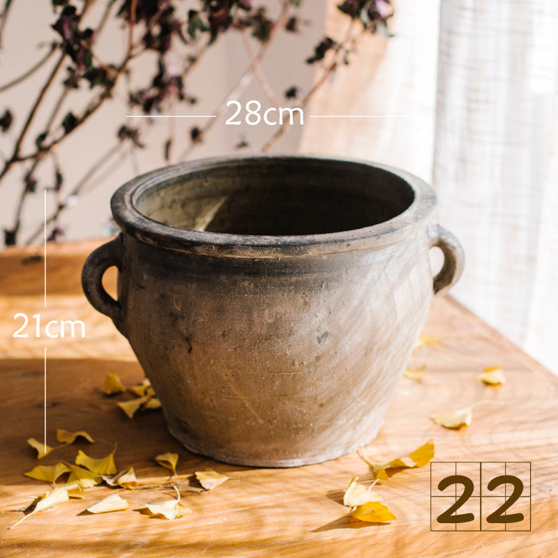 Rustic ceramic pot with handmade design