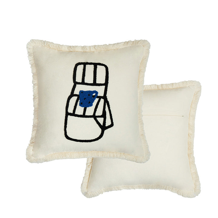 Woven decorative pillow cover with embroidered café motif and decorative fringe edge