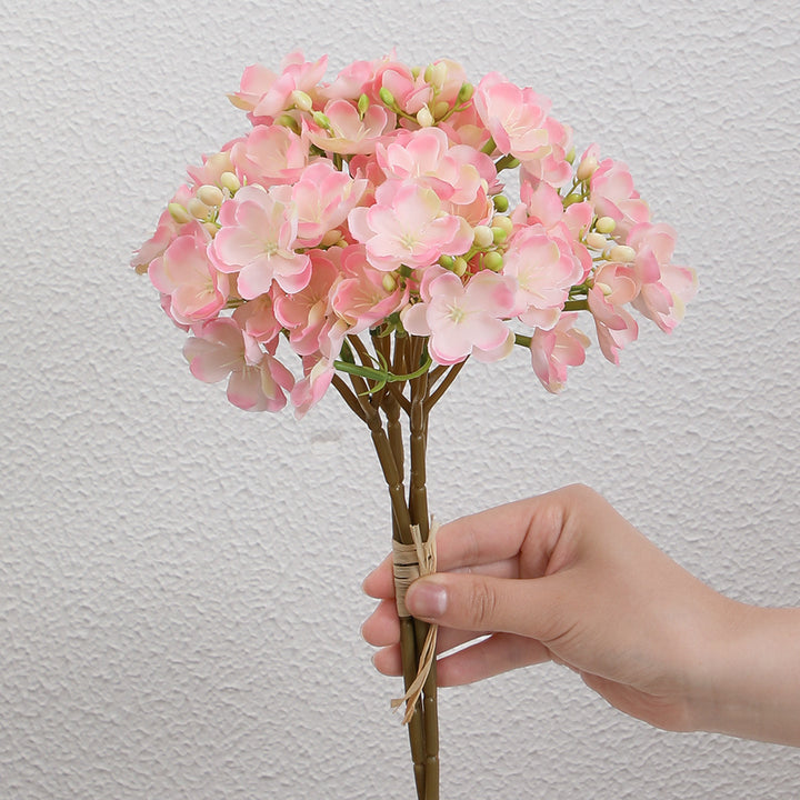 Artificial flower bouquet with delicate blooms