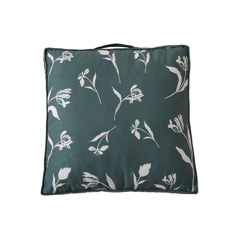 Padded chair cushion with carrying handle and decorative stitching