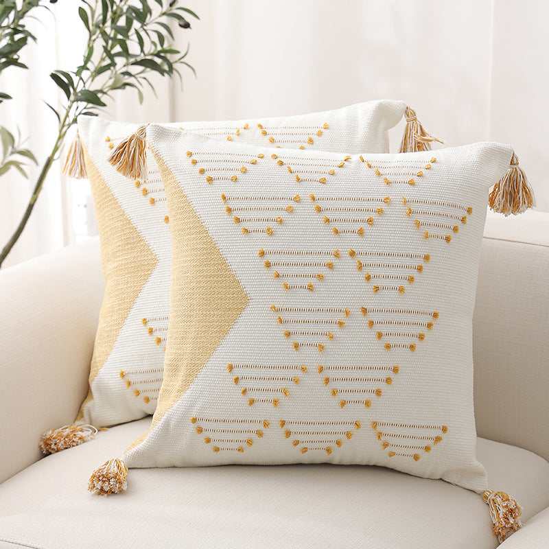 Woven decorative cushion cover with geometric tuft pattern, tassels and concealed zipper