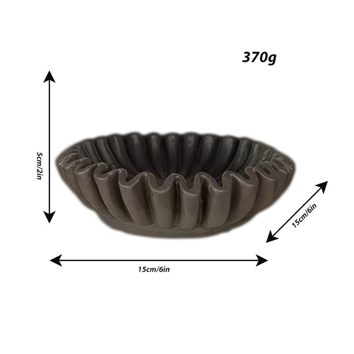 Decorative serving bowl with wave design