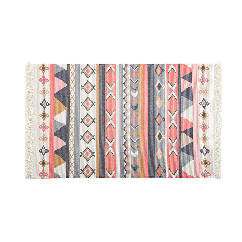 Flat-woven runner rug in ethnic stripe design with hand-fringed edge