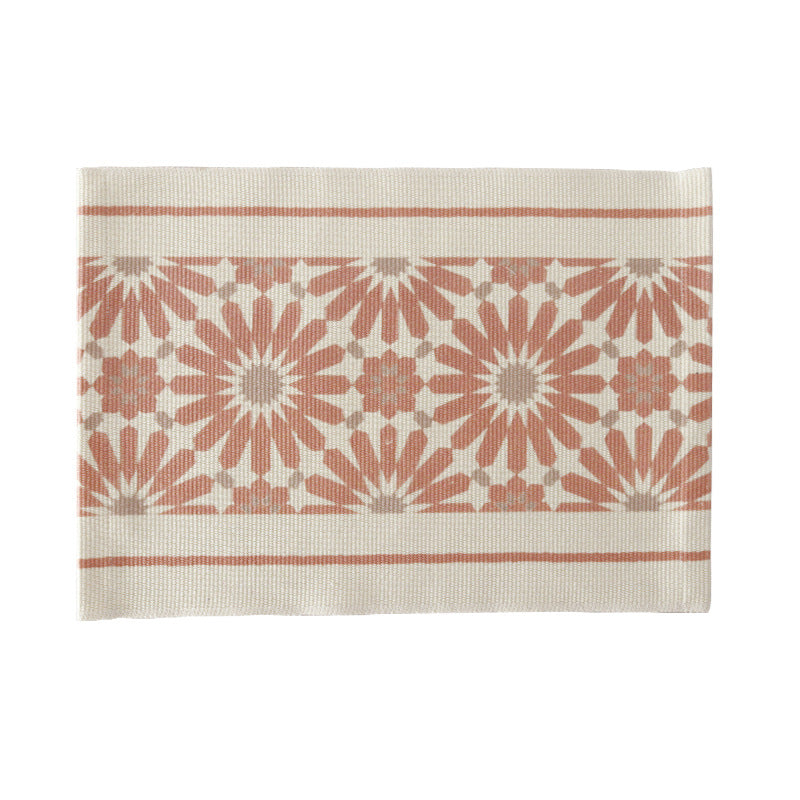 Woven placemat made of cotton blend with geometric diamond trim and fine texture