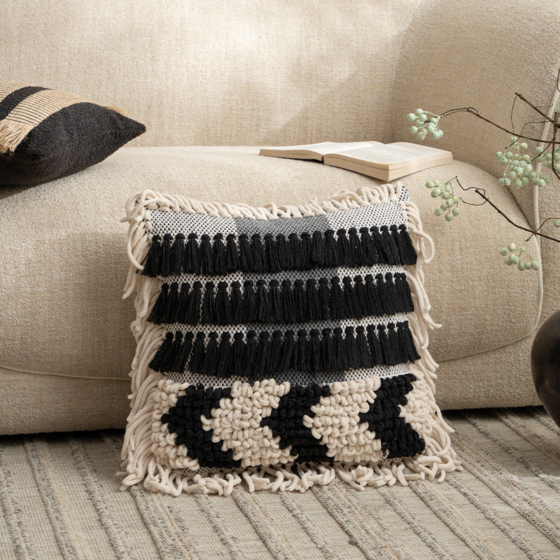 Boho cushion cover with macrame, tassels and relief texture