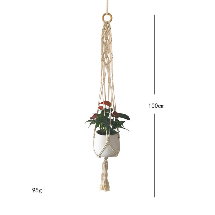Macrame plant hanger with decorative tassels