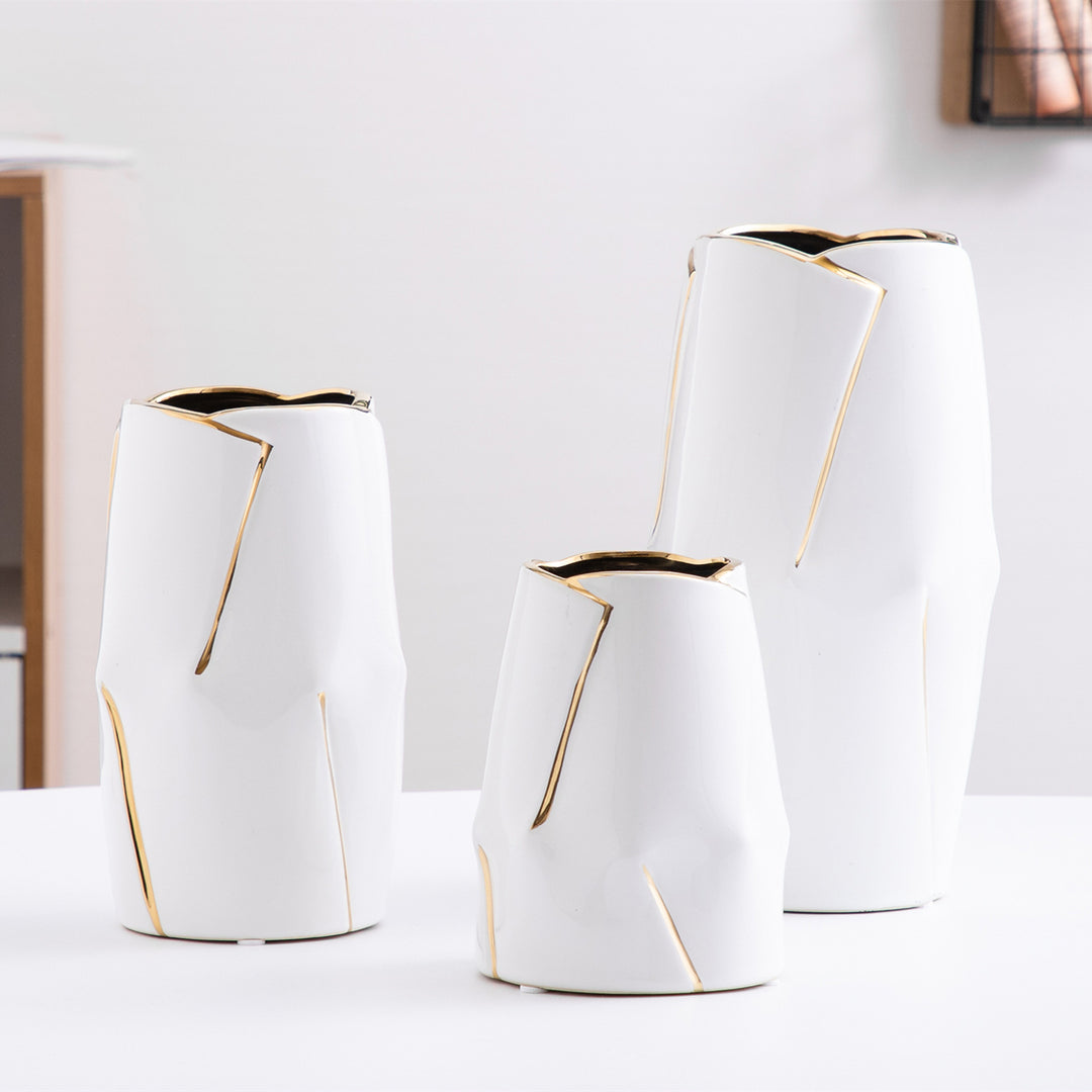 Decorative ceramic vase with golden accents