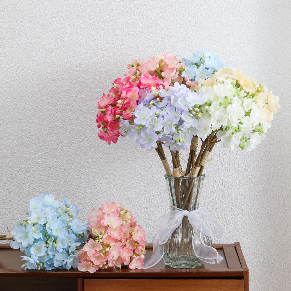 Artificial flower bouquet with delicate blooms