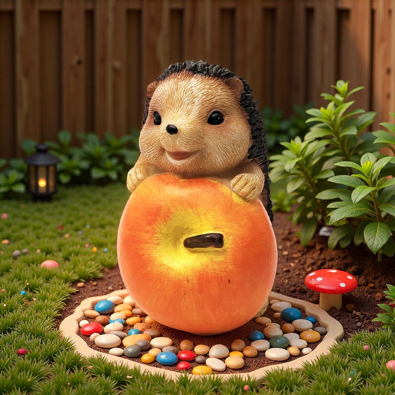 Cute hedgehog sculpture with fruit