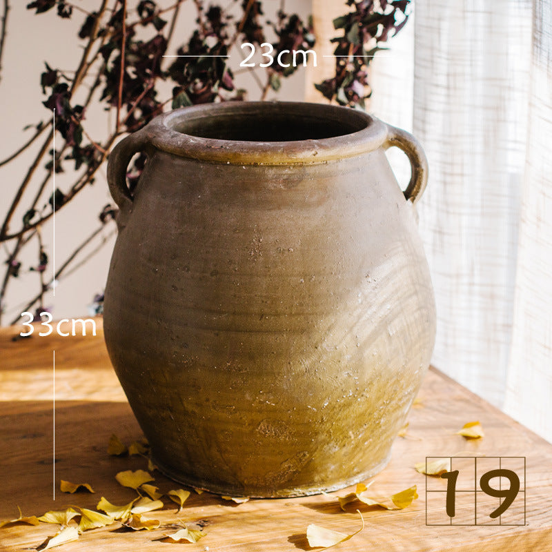 Rustic ceramic pot with handmade design