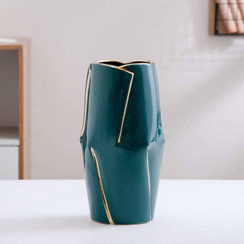 Decorative ceramic vase with golden accents