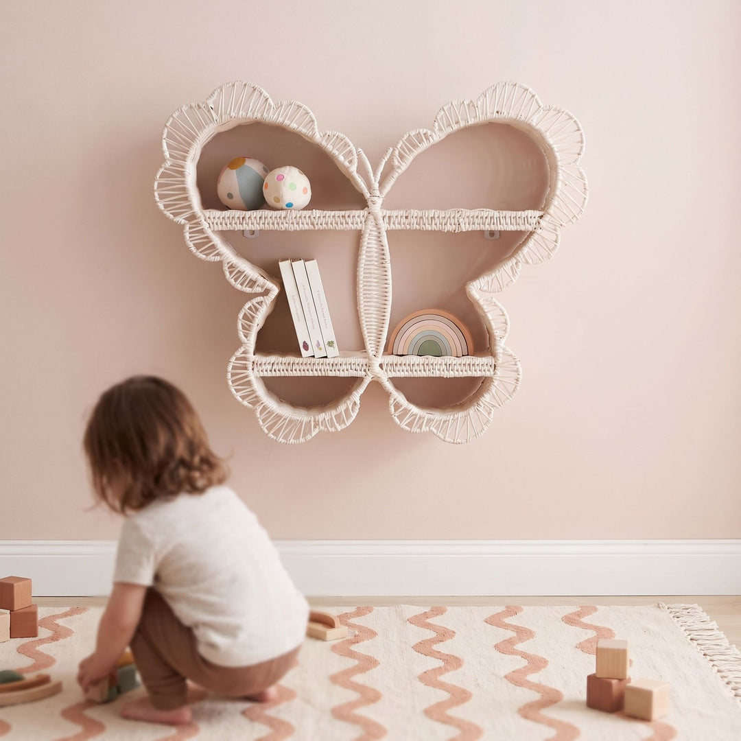 Playful wall shelf in butterfly design