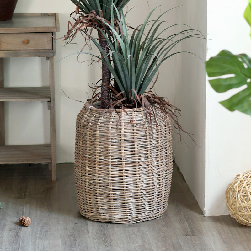 Stylish laundry basket made of braided natural material
