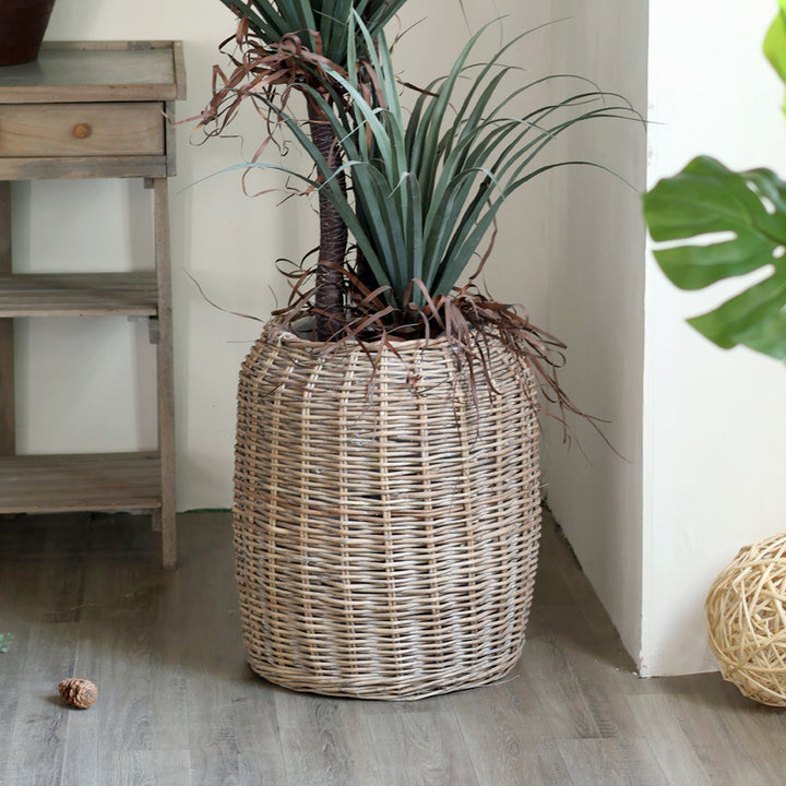 Stylish laundry basket made of braided natural material