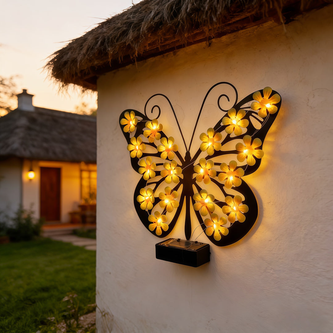 Decorative metal butterfly wall lamp with solar-powered flower LED string