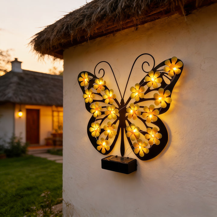 Decorative metal butterfly wall lamp with solar-powered flower LED string