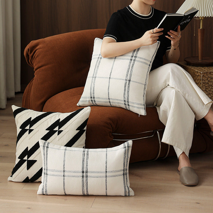 Rectangular woven cushion cover with checkered texture pattern and concealed zipper