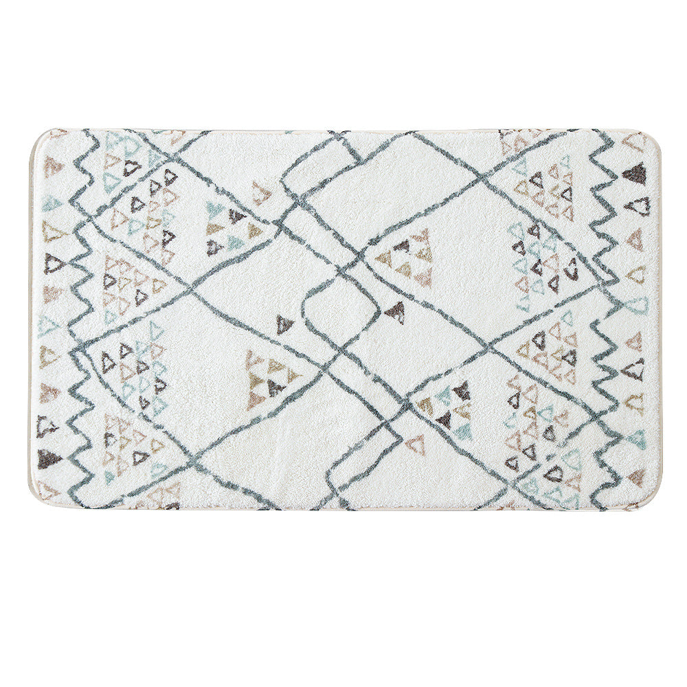 Boho cotton bath mat with fringes and geometric diamond pattern