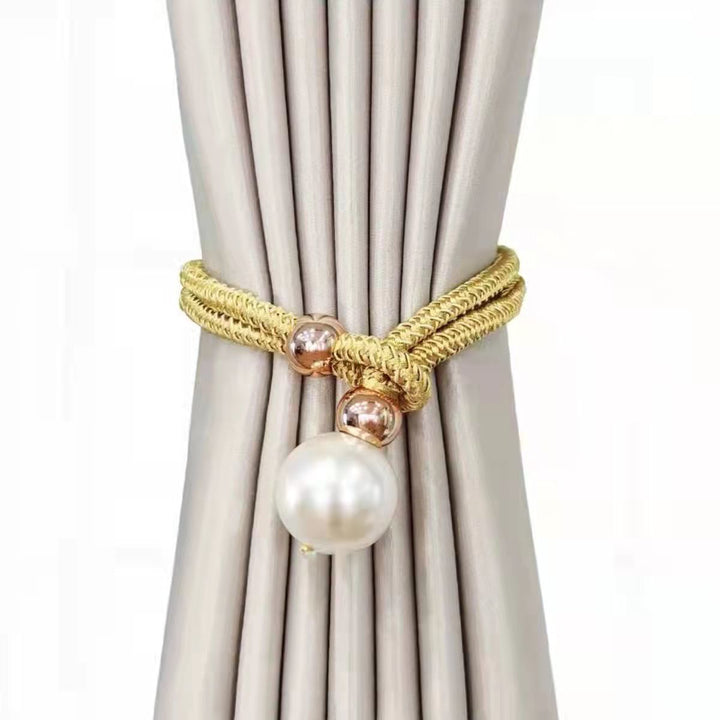Elegant curtain tieback with decorative pearl