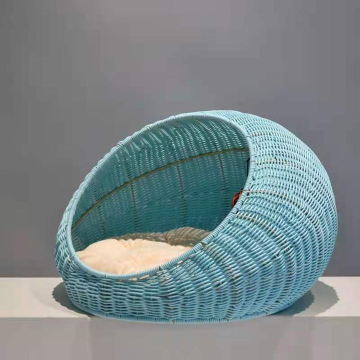 Cozy cat bed made of woven natural material