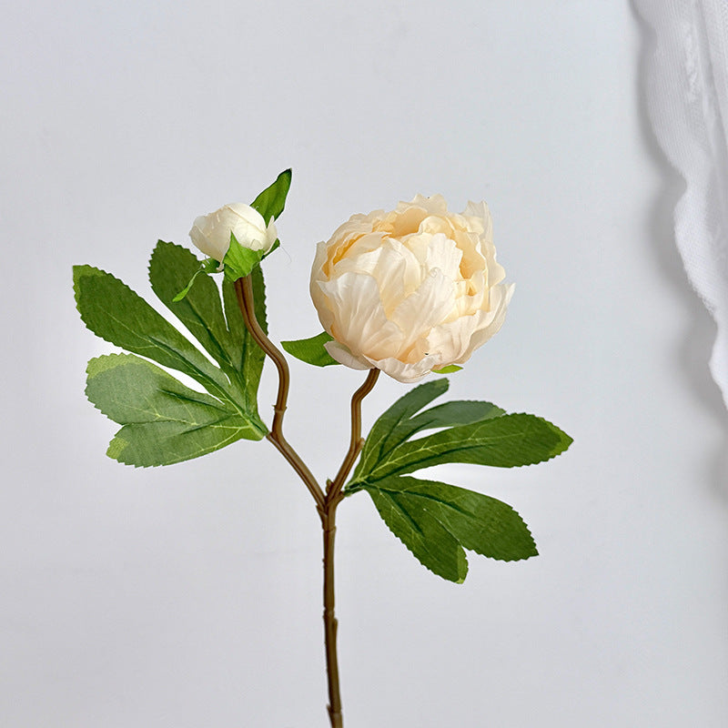 Artificial peony bouquet with delicate flowers and leaves
