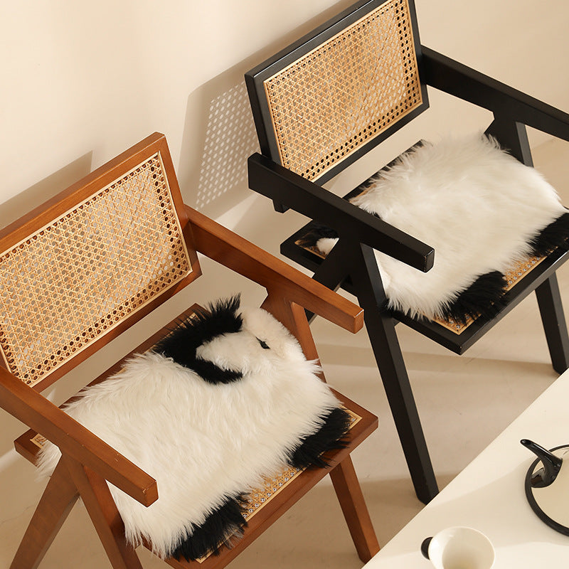 Plush cuddly pillow in sheep shape with dense artificial fur and soft polyester filling