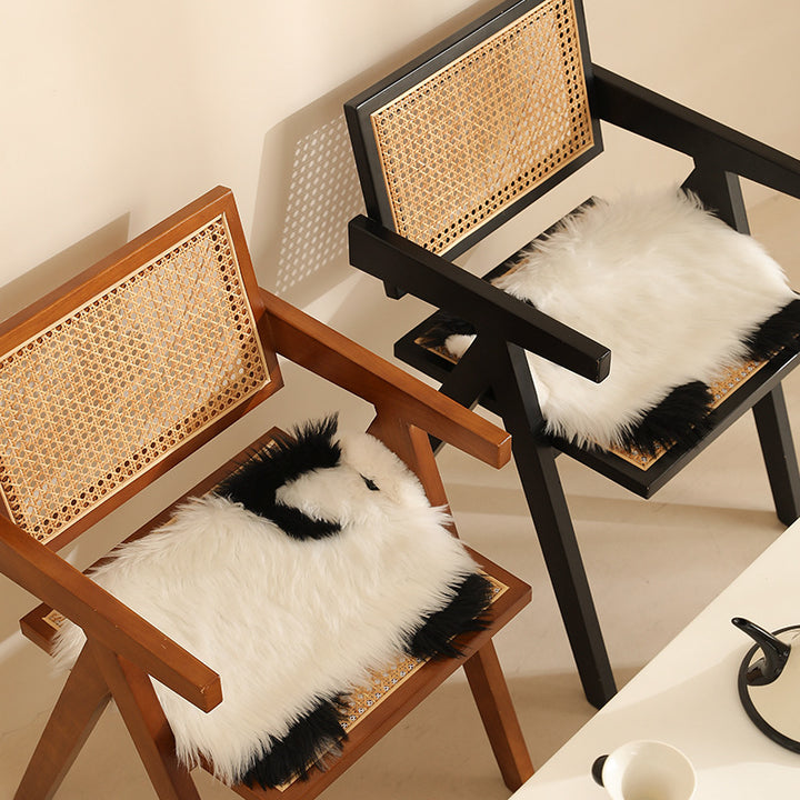 Plush cuddly pillow in sheep shape with dense artificial fur and soft polyester filling