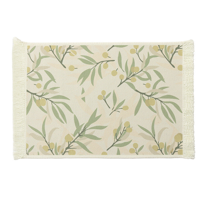 Floral woven bath mat with decorative fringes