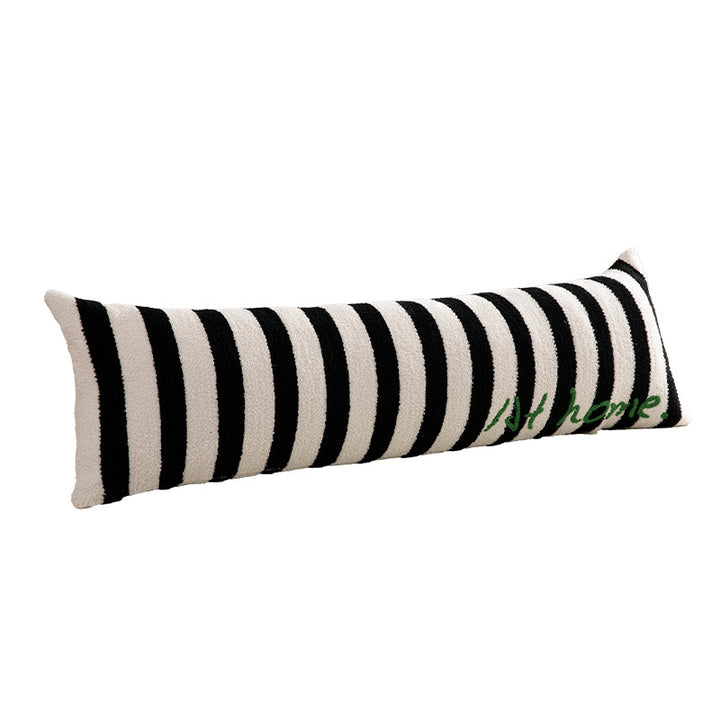 Elongated bench and windowsill cushion with nautical stripe texture and embroidered lettering