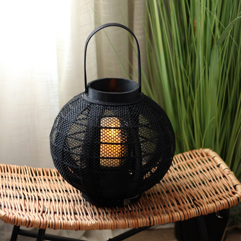 Elegant metal lantern with net design