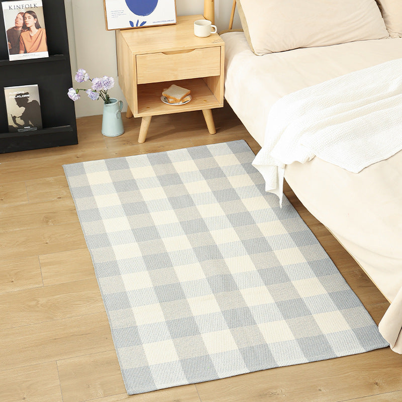 Modern flat-weave area rug with contrasting stripes and non-slip underside