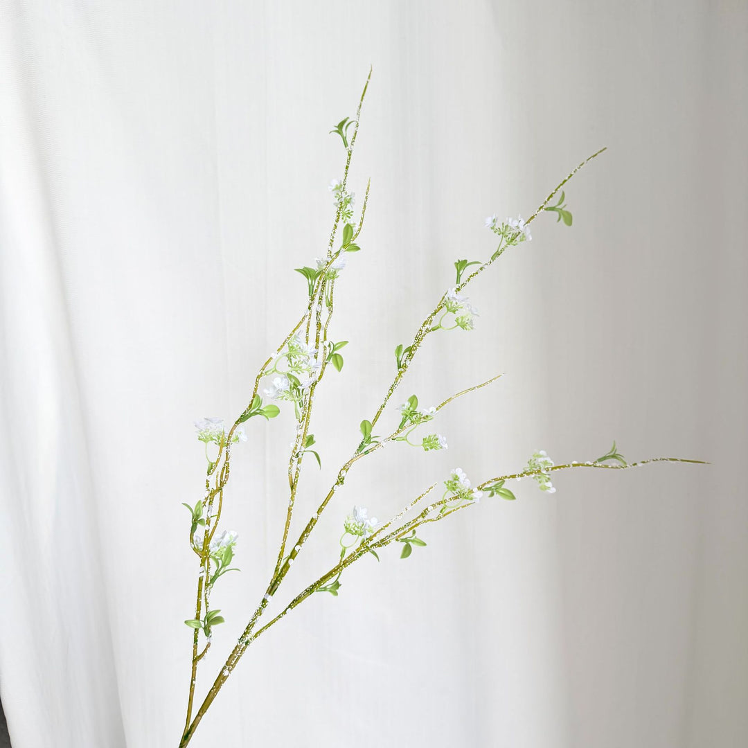 Artificial flower branch with detailed flowers