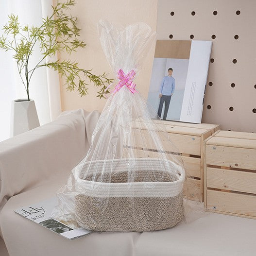 Natural storage basket with ribbons