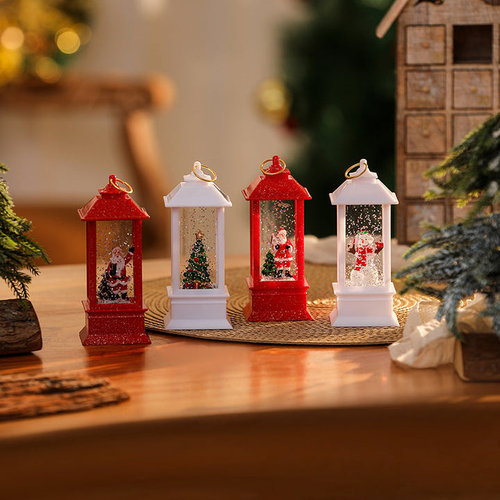 Illuminated Christmas lantern with glittering snowman scene