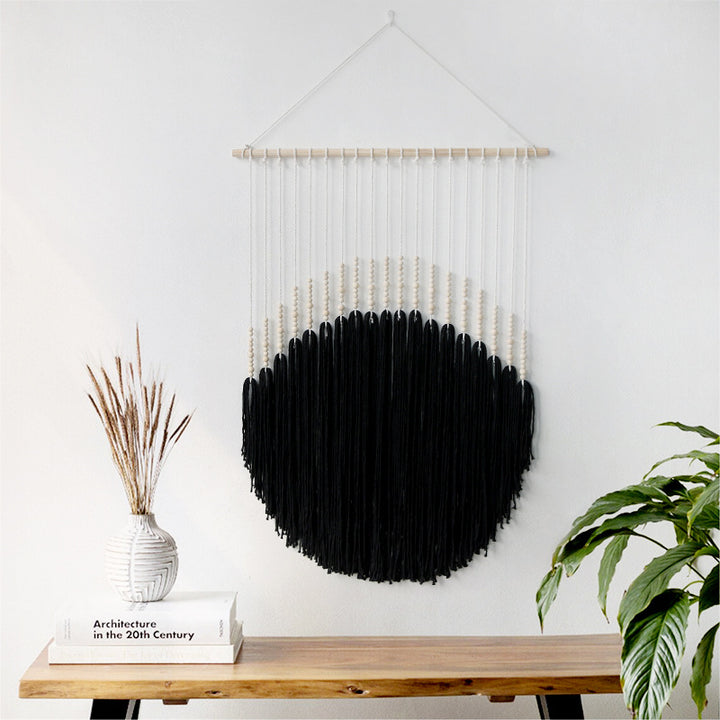 Decorative wall art with wooden beads and thread pendulum