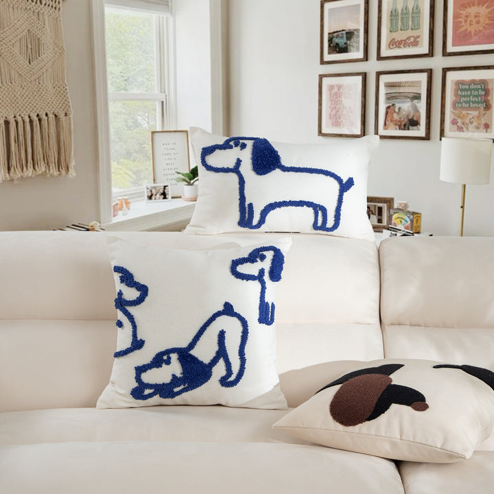 Rectangular decorative lumbar pillow with hand-tufted dog motif made of cotton blend