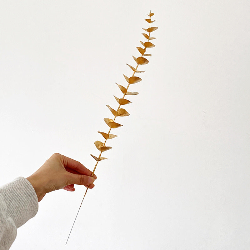 Decorative artificial flower branch with delicate details