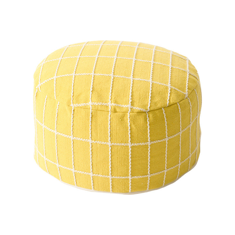 Round seat pouf with knitted check cover and shape-stable inner core