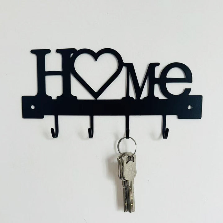 Metal key holder with cat design